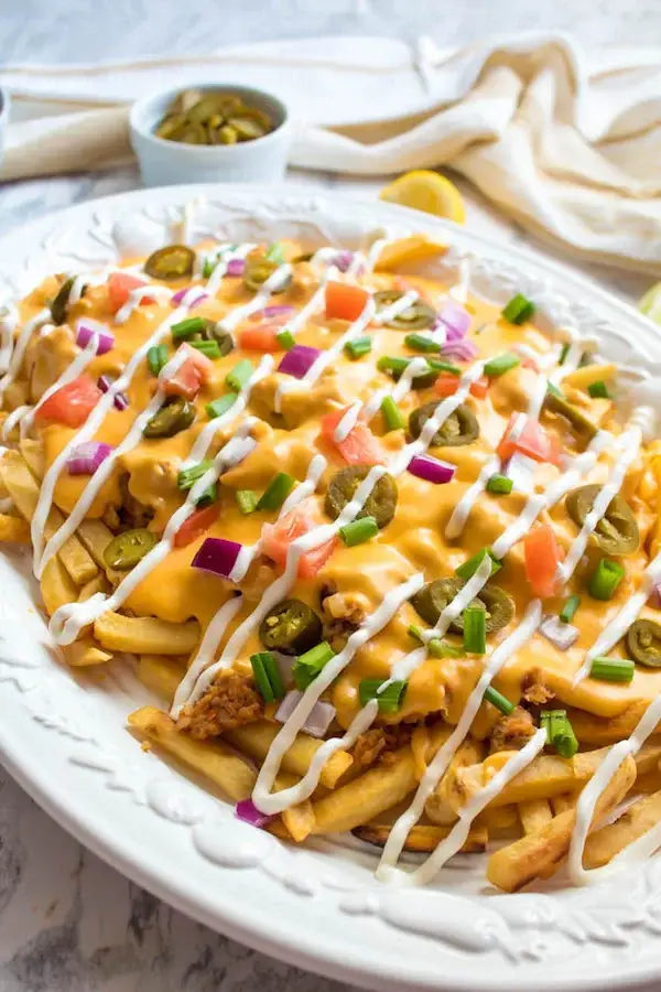 Loaded with seasoned halal beef, crispy fries, melted cheese, and flavorful sauces, these street-food-style loaded fries are the ultimate comfort snack for movie nights or late-night cravings. halalfoodsanti